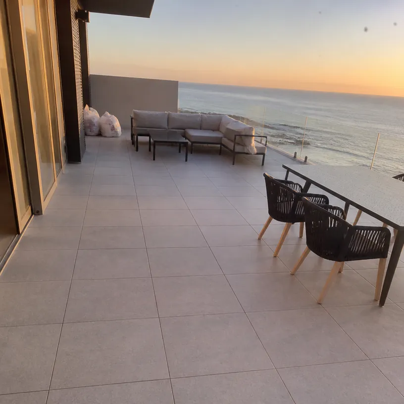 Wide-format porcelain patio paving — an example of the finishes we install in Cape Town